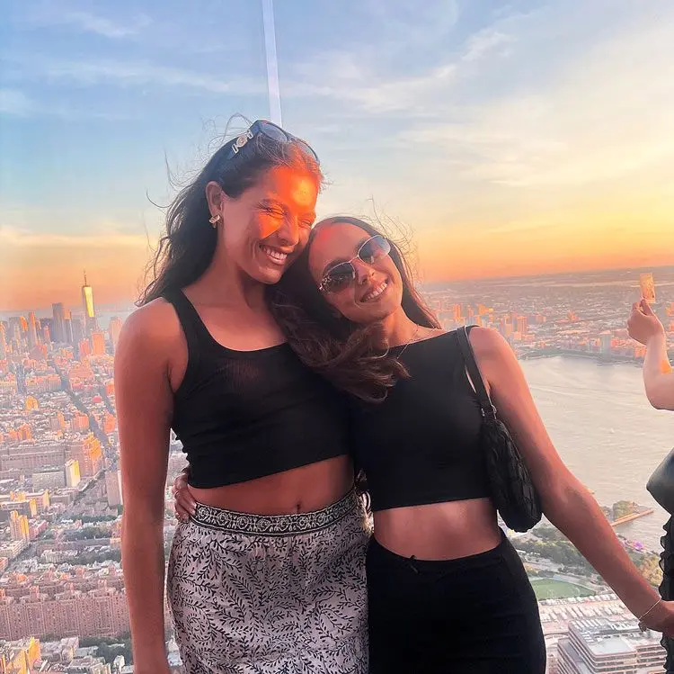 Girls on NYC rooftop at sunset.